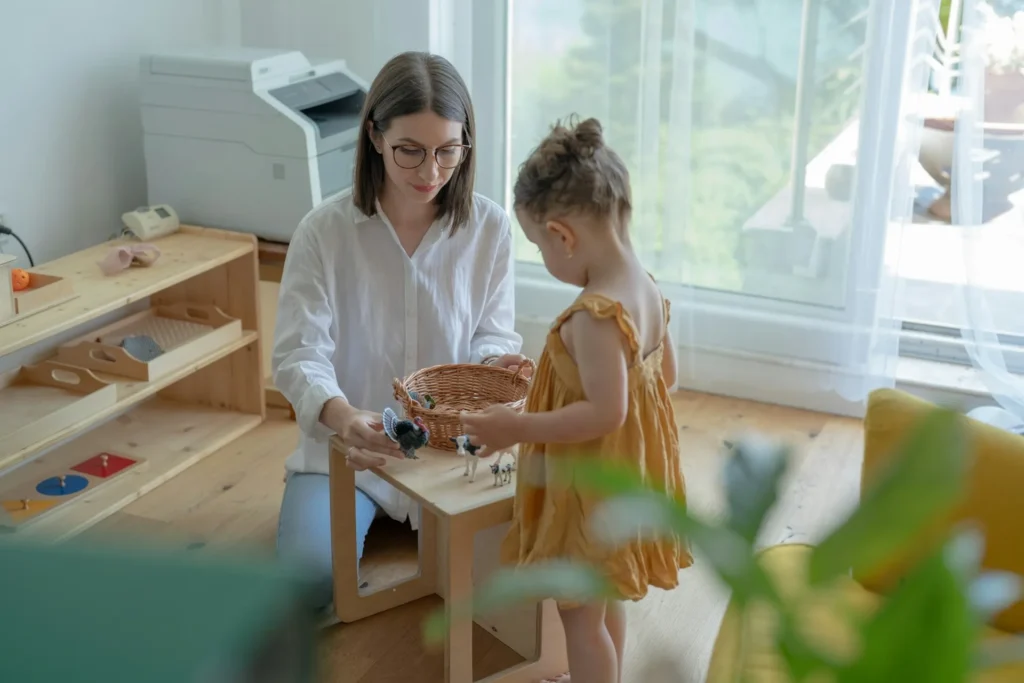 A mother playing with her daughter.