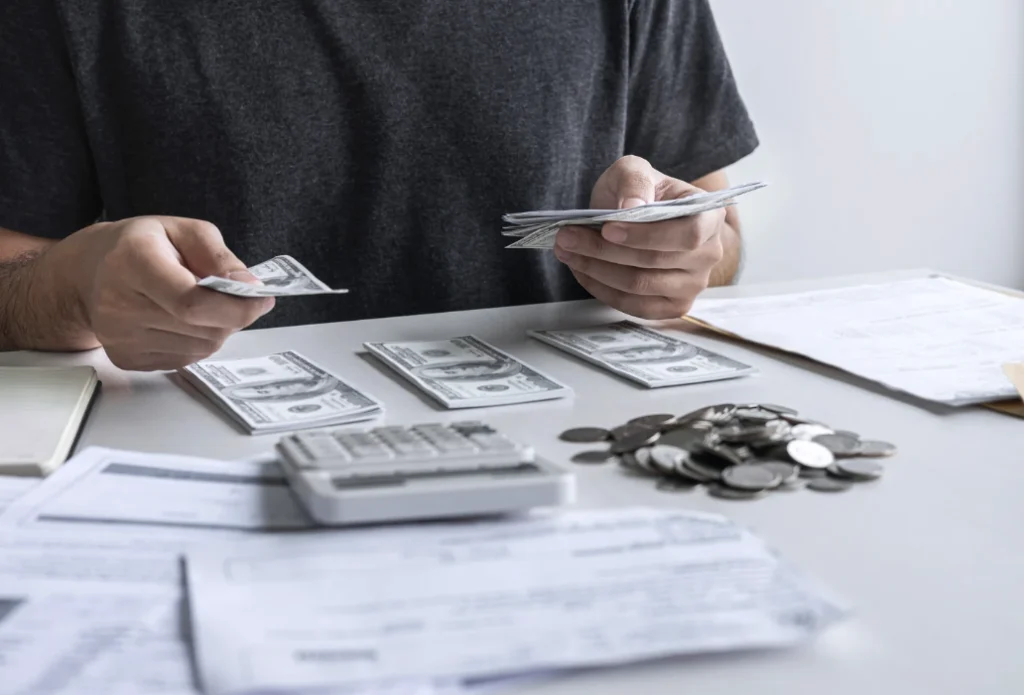 Man reviewing financial documents related to conservatorship.